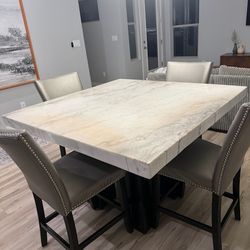 Steve Silver Marble Dining Table with Ebony Hardware