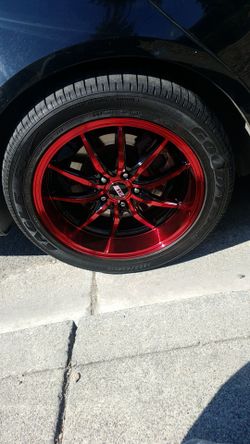 GM, CHEVY, PONTIAC. 2 five by 115mm rims for sale with one with 70% tread and the other with like 40%