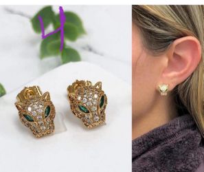 🐆 18K Gold-Plated Crystal Panther Stud EarringsChannel your inner strength and high-fashion elegance with these captivating Crystal Panther Head Stud