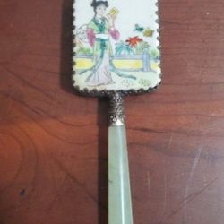 Old Japanese Hand Held Mirror; Jade Handle Enamel Back Featuring Woman with Bird in Hair.
