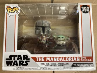 Funko Pop! Star Wars The Mandalorian with The Child From Star Wars: The Mandalorian is Mandalorian and The Child as a stylized Pop! Moment vinyl bo