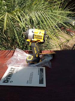 DeWalt  20 v new atomic  impact wrench.   1/2".   Brushless motor  2 speed