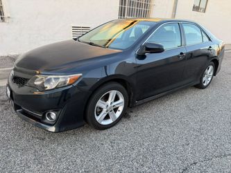 2014 Toyota Camry tÃtulo limpio