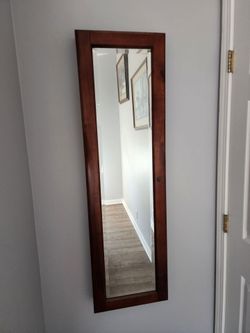 Mirrored wall jewelry case.