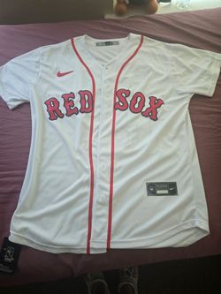 Boston Red Sox Dustin Pedroia jersey featuring a 2018 World Series Champions patch on the sleeve.