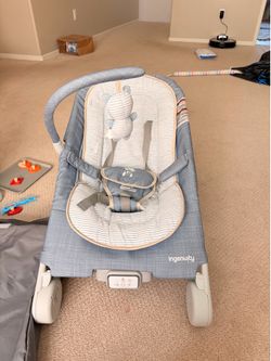 Ingenuity Gas Relief and Anti-Colic Baby Bouncer Seat and Rocker, Gentle Belly Massage to Relax and Soothe Bellies, Instant Tummy Soother, 20 Songs an