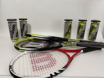 tennis rackets and 14 balls