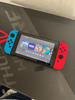 Nintendo Switch with Neon Red and Blue Joy-Cons