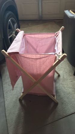 Pink laundry hamper
