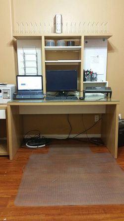 Computer and study desk from ikea. Includes: Table with glass top Hutch Side printer table with drawer Condition: Lightly used, almost new.