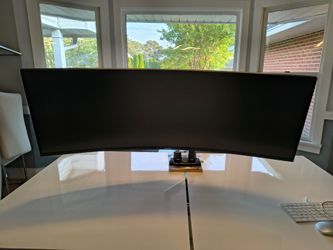 Samsung 49in ultra wide curved computer monitor with arm stand