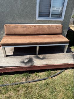 Large patio bench with suede cushioning
