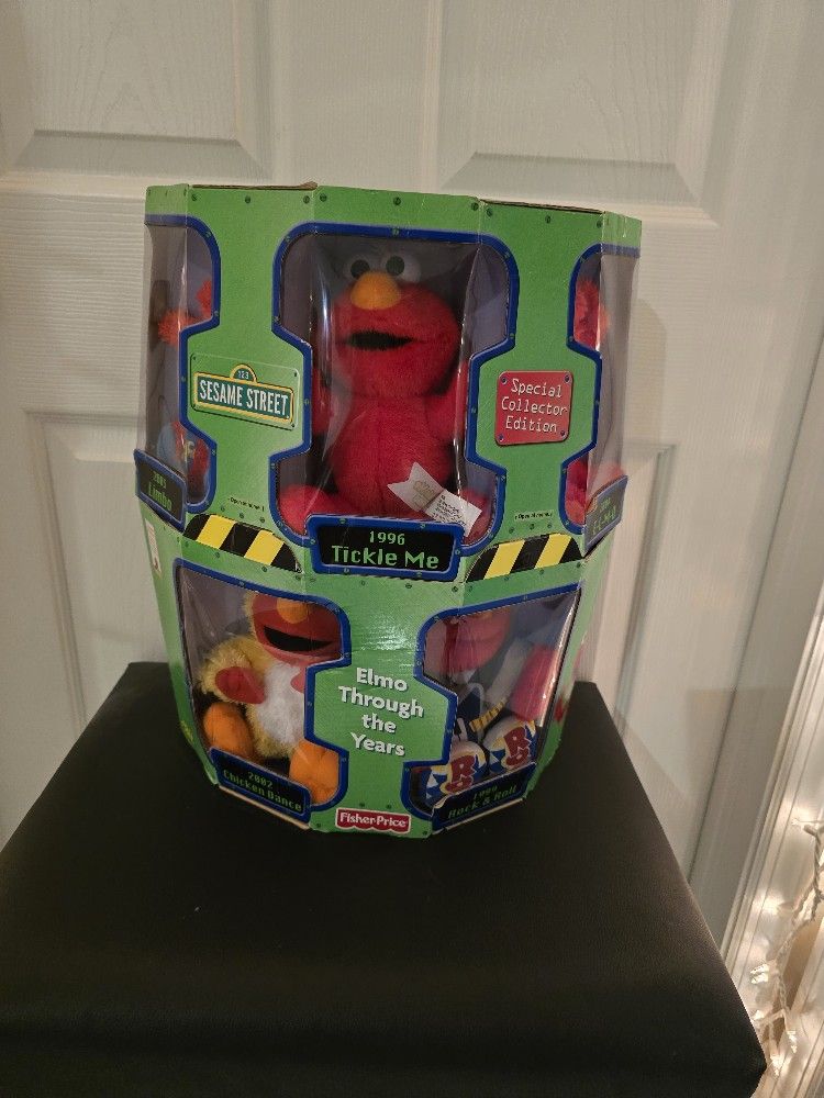 Elmo Through The Years Plushies