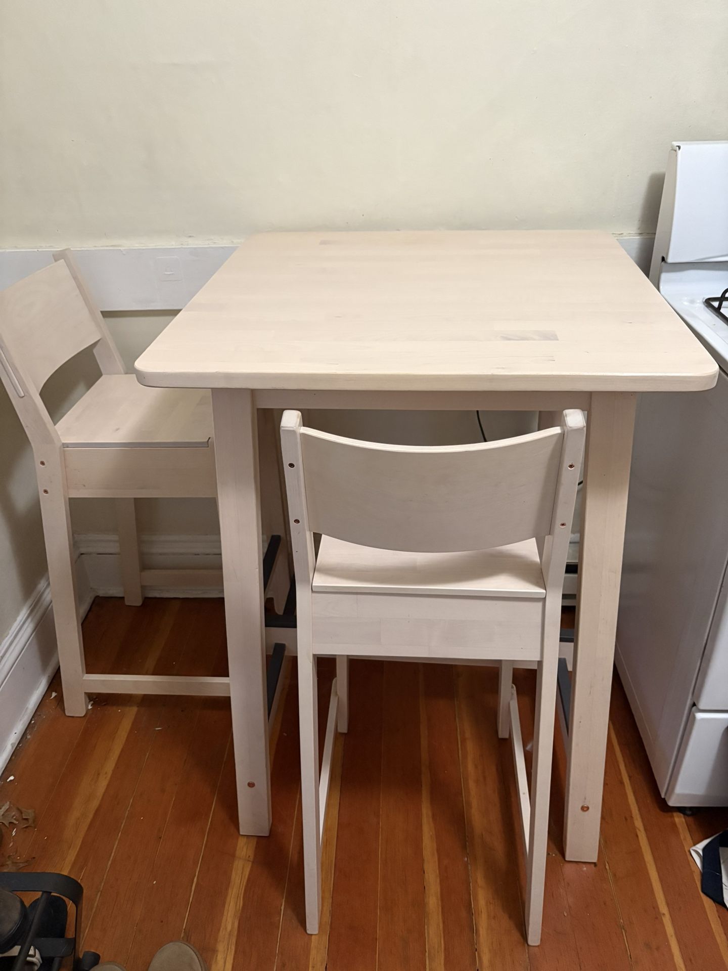 KEA RUNNINGE birch bar table with 2 NORDVIKEN bar chairs.