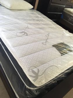 Double sided pilots top mattress and box spring