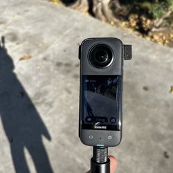Insta360 X3 with selfie stick