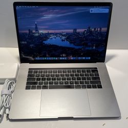 MacBook Pro (15-inch, 2019 ) Core I7 , Memory 16 Gb Ram , Storage 256 SSD , Cokes With Charger 