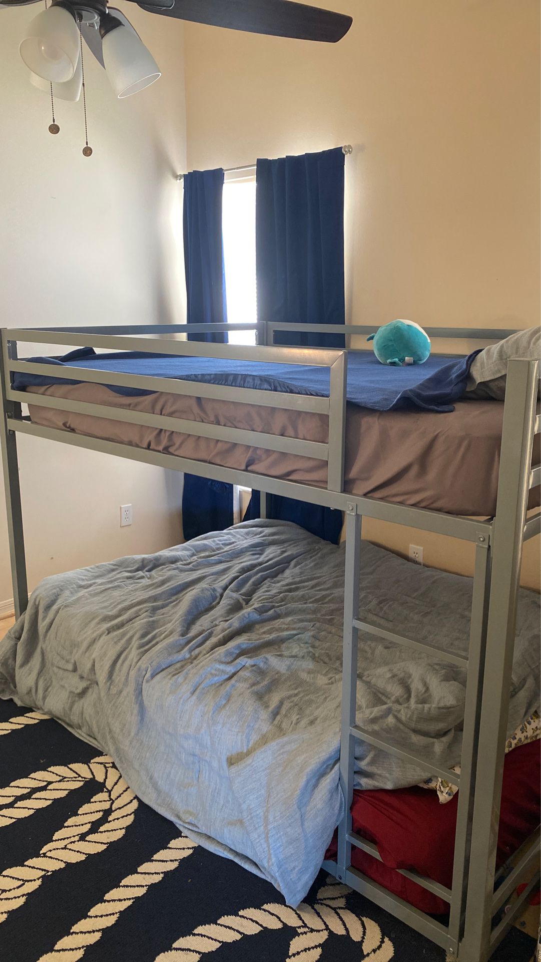 Full size over full size bunk beds with mattresses