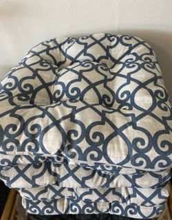 Six blue patterned patio cushions 