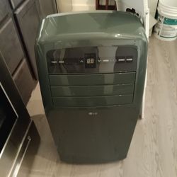 12,000 LG PORTABLE AC LIKE NEW WORKS FANTASTIC .