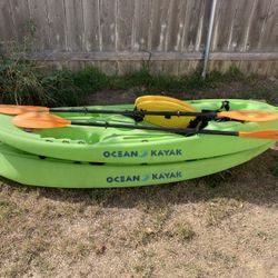 Two Sit On Top Ocean Kayaks And Paddles