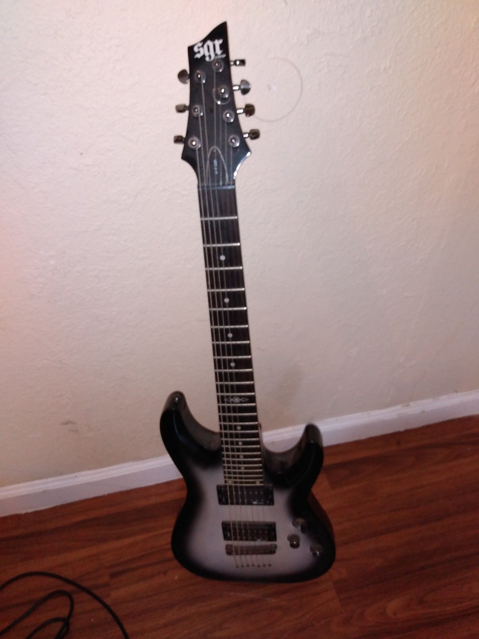 Schecter 7 string electric guitar with bag and strap