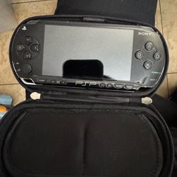 PSP 1000 with OEM Charger for sale