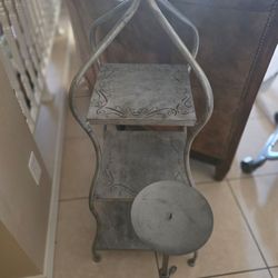 Metal plant shelf and candle stick
