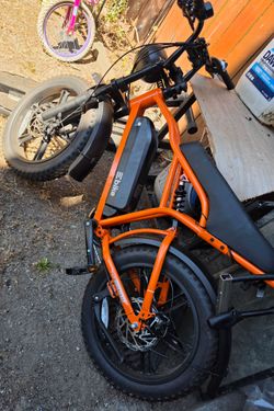 Orange electric bike.