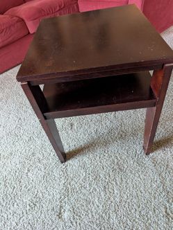 2 identical end tables dark brown wood.