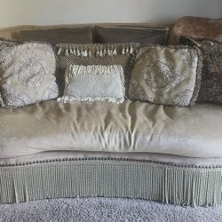 Beautiful classic fabric sofa featuring a sturdy wooden frame.