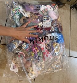 New a full bag of hair bands/clips