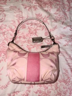 pink Coach Signature Stripe hobo bag