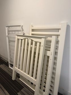 White Wooden Baby Crib Disassembled