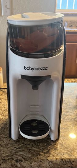 Babybrezza baby formula dispenser