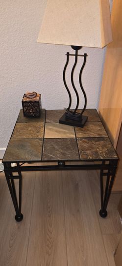 One coffee table, two end tables Black cast iron with slate stone removable tiles $80. all 3!!