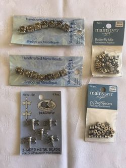Metal craft beads - $3 each package.