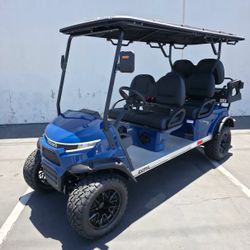 2026 VOYAGER PATRIOT  6-PASSENGER LIFTED LSV/NEV IN METALLIC GLOSS NAVY BLUE W/BLACK SEATS W/NAVY PIPING AND STITCHING