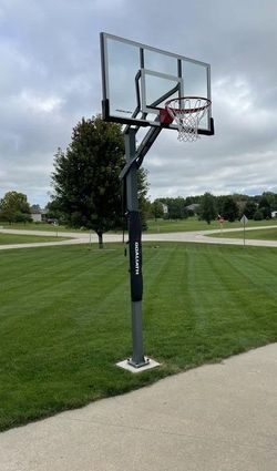 Goaliath 54 inch in ground basketball hoop, adjustable basketball court