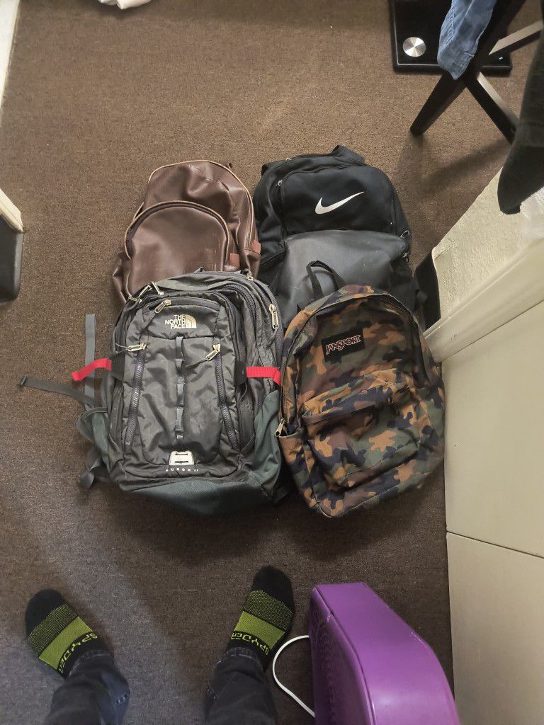 4 backpacks in good cond