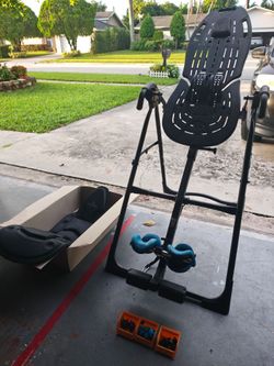 TEETER ComforTrak EP-560 Inversion Table, Decompression Surface for Full-Body Stretch, Ergo Embrace Ankle Supports, Integrated Accessories, UL Safety