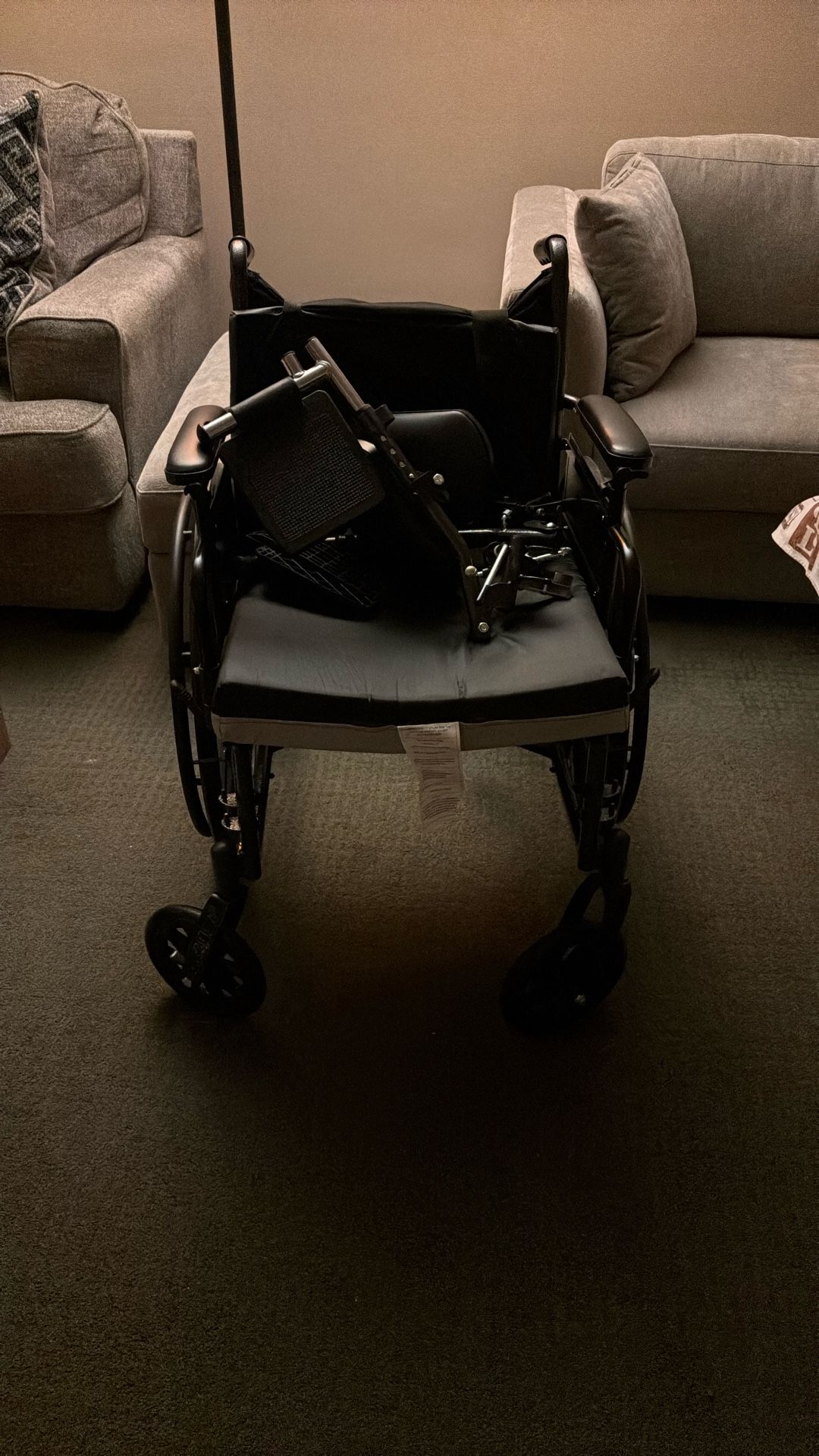 Cushioned Wheelchair With Footrests