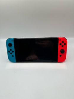 Nintendo Switch Neon Blue and Red With 8 Games