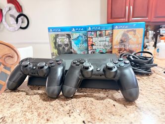 PlayStation 4 Slim 1tb  completo espectacular Con 4 juegos tengo más a escojer +2 control ps4