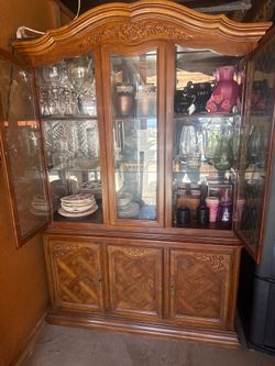 China hutch with light has cabinets below $45