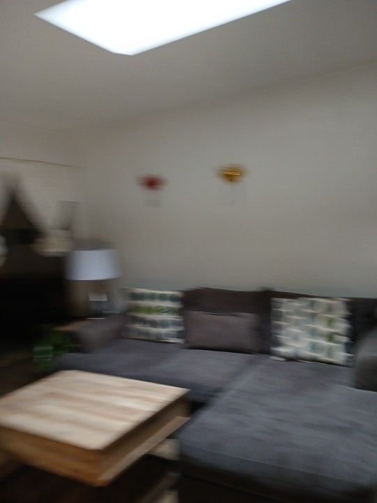 Section Furniture With Two Lamps Two End Tables And Middle Table