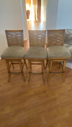 4 Heavy Swivel Barstools.