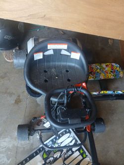 Kids go cart with charger.