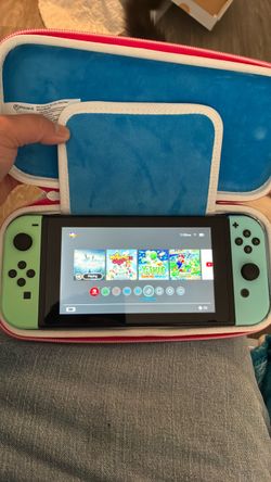 Nintendo switch + 1 game & carrying case
