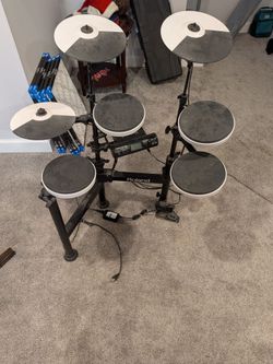 Electric practice drum kit